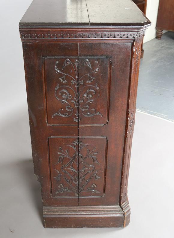 TooveysA late Victorian Aesthetic Movement stained oak chest of six drawers