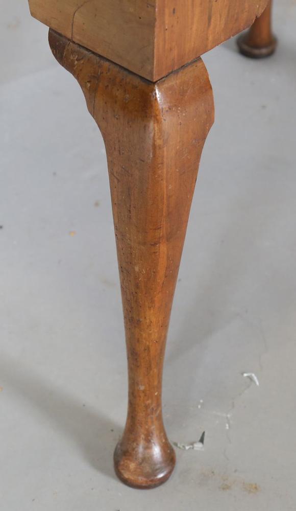 TooveysAn 18th century and later walnut lowboy, fitted with three oak-lined