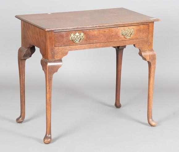 TooveysA late 19th century provincial oak side table, fitted with a single