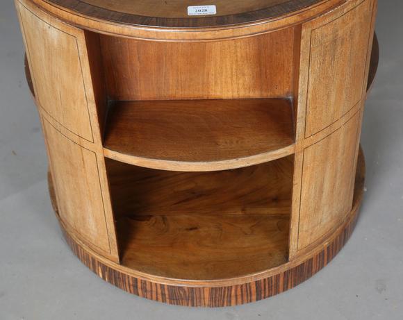 TooveysAn Art Deco walnut revolving book table by Heal & Son Ltd, the quart