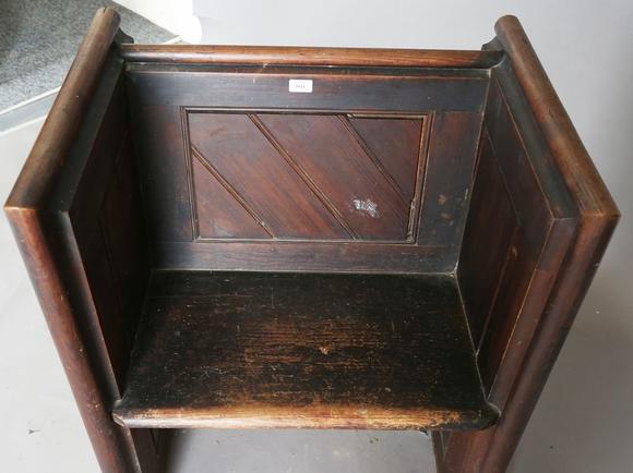 TooveysA late Victorian pitch pine cut-down pew with arched panel ends, hei