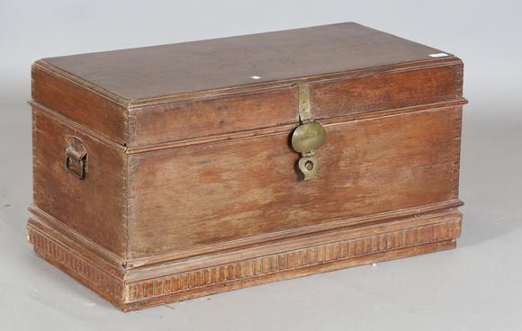 TooveysA 20th century Burmese hardwood trunk, the hinged lid inset with arc