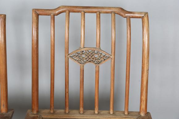 TooveysTwo pairs of Chinese softwood chairs with carved backs and solid pan