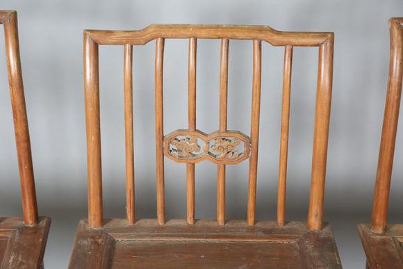 TooveysTwo pairs of Chinese softwood chairs with carved backs and solid pan