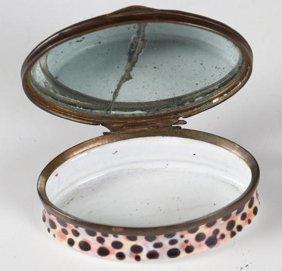 TooveysAn 18th century South Staffordshire enamel oval snuff box, decorated
