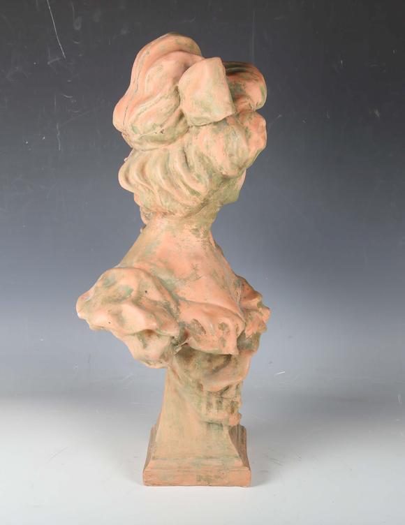 TooveysA modern cast composition head and shoulders portrait bust of a youn