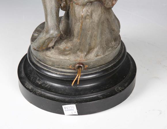 TooveysA late 19th century cast spelter figural table lamp in the form of a