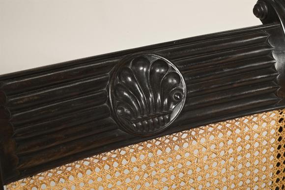 DreweattsY A CLOSELY MATCHED PAIR OF CEYLONESE CARVED EBONY ARMCHAIRS, FIRST HALD 19TH CENTURY