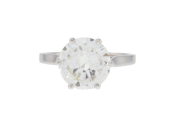 Piguet - H?tel des VentesBucherer, solitaire or gris 750 serti d'un diamant taille brillant