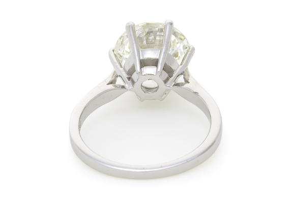 Piguet - H?tel des VentesBucherer, solitaire or gris 750 serti d'un diamant taille brillant