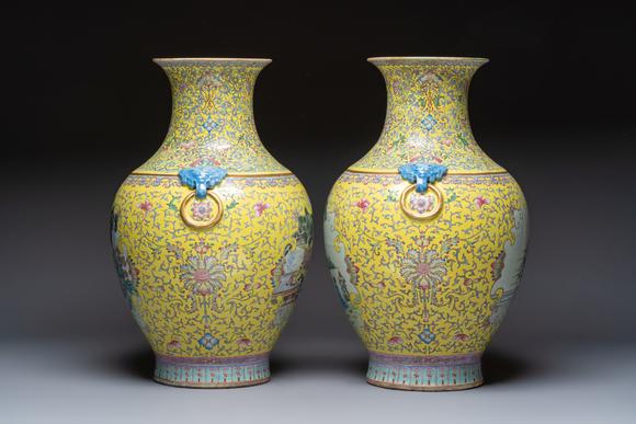 Rob Michiels AuctionsA pair of large Chinese famille rose yellow-ground 'Hu' vases with narrative design, Qianlong mark, Republic