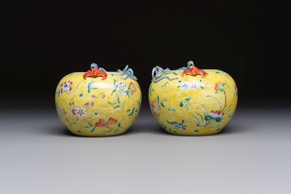 Rob Michiels AuctionsA pair of Chinese famille rose yellow-ground water pots with floral design and applied chilong and bats, Qianlong mark, 19/20th C.