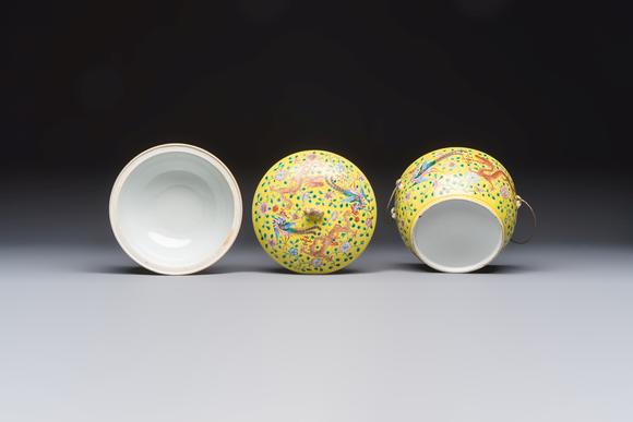 Rob Michiels AuctionsA pair of Chinese famille rose yellow-ground 'Dragon and Phoenix' covered warming bowls and a bowl, Tongzhi marks, 19th C.