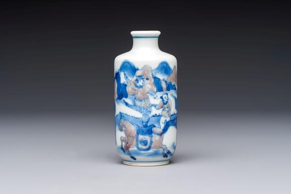 Rob Michiels AuctionsA Chinese blue, white and copper-red snuff bottle with narrative design, 19th C.
