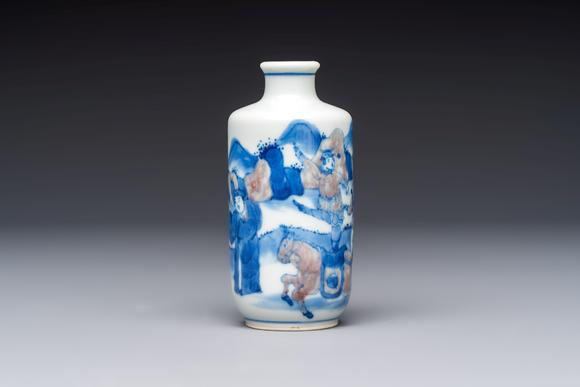 Rob Michiels AuctionsA Chinese blue, white and copper-red snuff bottle with narrative design, 19th C.