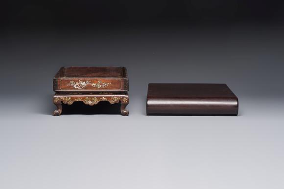 Rob Michiels AuctionsA Chinese or Vietnamese mother-of-pearl-inlaid wooden tray and a Chinese hongmu stand, 19/20th C.
