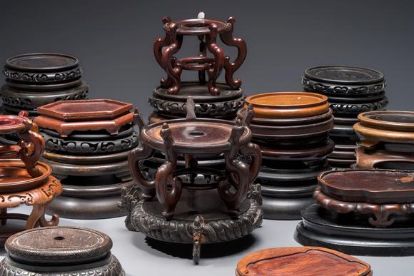 Rob Michiels AuctionsA collection of 40 mainly Chinese wooden stands, 19/20th C.