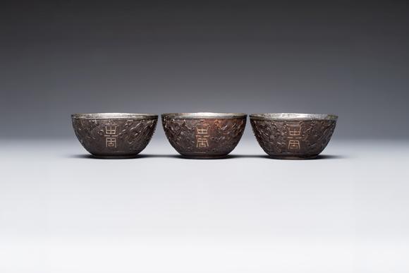 Rob Michiels AuctionsA group of 12 Chinese silver-lined coconut 'Shou 壽' bowls and cups, Wang Hengxin 王恆馨 marks, 19/20th C.