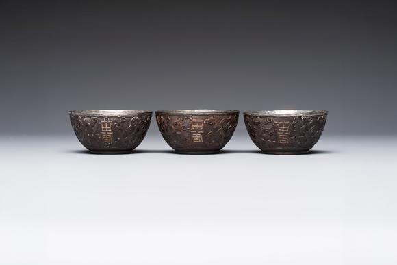 Rob Michiels AuctionsA group of 12 Chinese silver-lined coconut 'Shou 壽' bowls and cups, Wang Hengxin 王恆馨 marks, 19/20th C.