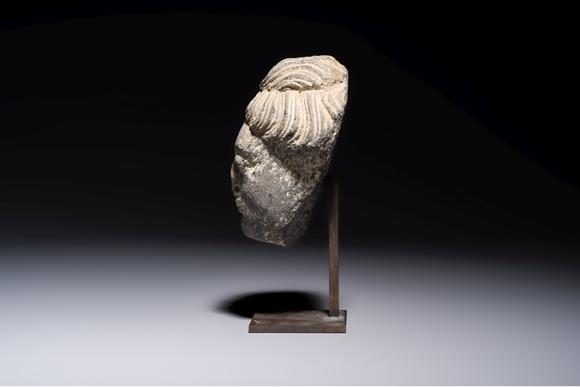 Rob Michiels AuctionsA Gandhara grey schist relief fragment of a Bodhisattva head, 3rd/4th C.