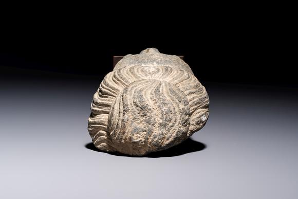 Rob Michiels AuctionsA Gandhara grey schist relief fragment of a Bodhisattva head, 3rd/4th C.
