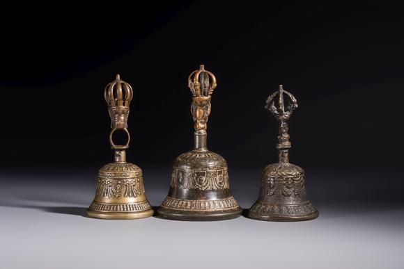 Rob Michiels AuctionsThree Tibetan bronze ritual bells and a bronze Buddha, 19th C.