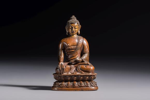 Rob Michiels AuctionsThree Tibetan bronze ritual bells and a bronze Buddha, 19th C.