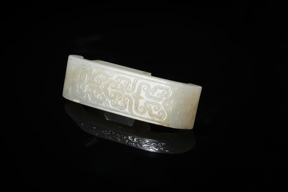 北京懋隆拍賣清 玉卷云紋劍璏