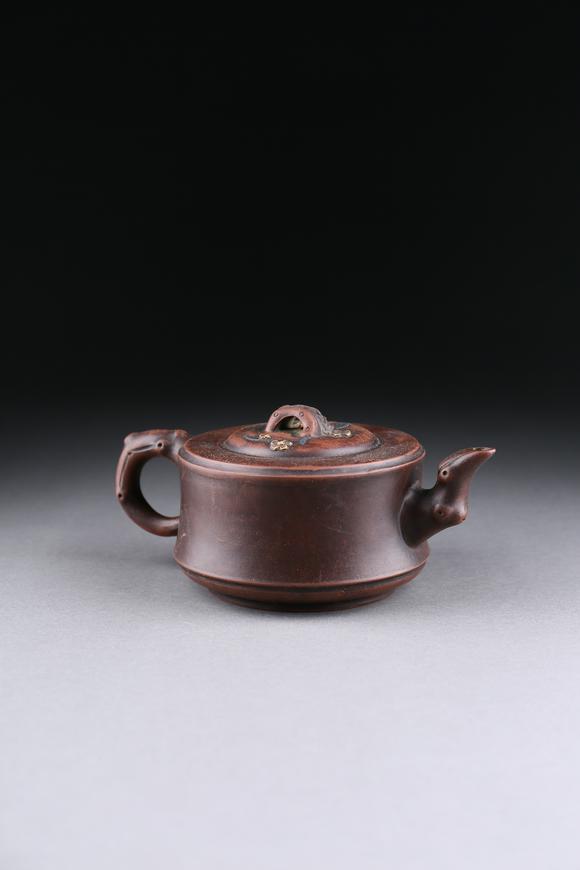 萬(wàn)領(lǐng)國(guó)際紫砂竹紋梅花壺