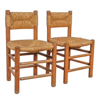 In the Manner of Charlotte Perriand (French 1903-1999) Pair of chairs