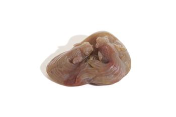 A carved soapstone group of two fish