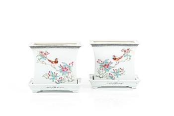 A pair of Chinese Famille Rose jardinières with stands