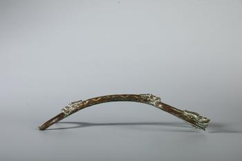 A Bronze Gold-Inlaid Dragon-Arm Ruyi Scepter, Warring States Period
