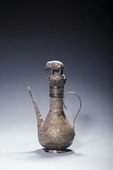 A Silver Ewer with Elephant Finial and Phoenix Decoration, China, 7th–10th centuries