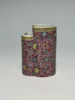 A Double-Compartment Famille Rose Brush Pot with Intertwined Floral Scrolls on Ruby Red Ground, 19th–20th Century