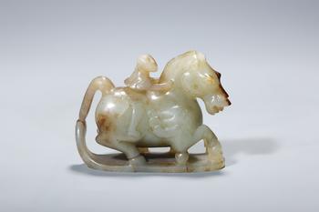 A Russet-Inclusion White Jade Horse with Immortal Rider, China, 2nd–1st centuries BCE
