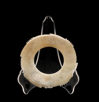 A Calcified Pale Jade Notched Bi, Late Neolithic, Circa 3300–2300 C BC Pr.