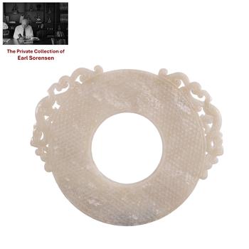 A CHINESE WHITE JADE BI WITH DRAGON OPENWORK