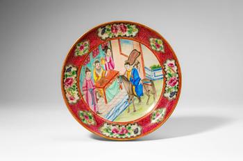 Qing Dynasty, Ca. AD 1644 - 1912. >A brightly enamelled famille rose porcelain plate, the interio