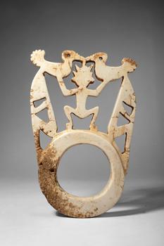 Ca. early 20th century AD. >
A pale stone openwork barava pendant features a complex figural comp
