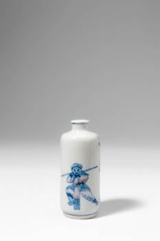 Qing Dynasty, Ca. AD 1644 - 1912. >
A slender porcelain snuff bottle of cylindrical form with a s