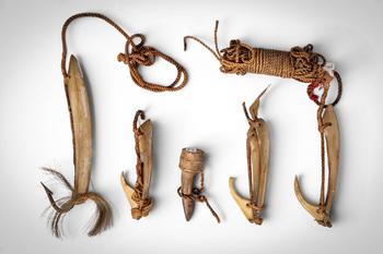 Ca. late 19th - early 20th century AD. >
A group comprising carved fish hooks of varying form, wo