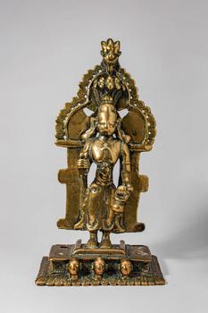 Ca. 17th-18th century AD.
A cast brass figure of Jina Parsvanatha, the 23rd Tirthankara, standing