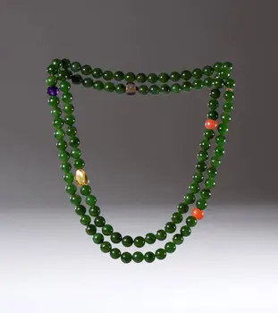 Mala composed of 108 green jade, carnelian, amethyst, smoky quartz, and citrine beads. China, Qing Dynasty (1644-1912), 19th century.