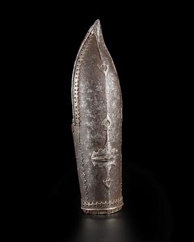 A steel arm guard (dastana),
Tanjore, South India, 16th/17th century,?

Of typical form, the deflector consisting of hanging and rising palmette i