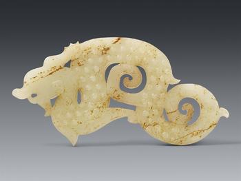 A rare celadon-coloured jade pendant. Song dynasty (1126–1279)