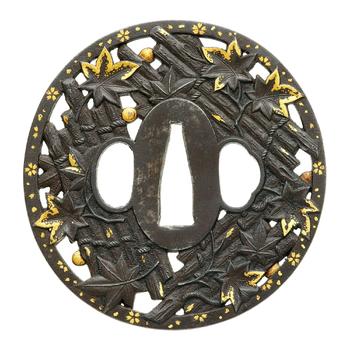 An iron tsuba. 18/19th century