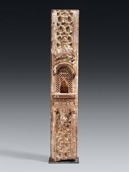 A Mughal carved red stone and painted white pillar with a jharokha window. India, Rajasthan. 18/19th century