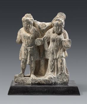An interesting Gandharan grey shist fragment with two figures. Pakistan. Kushan period, around 2nd century