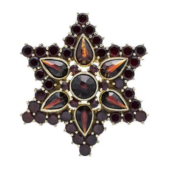 Star-shaped garnet brooch, 925/000